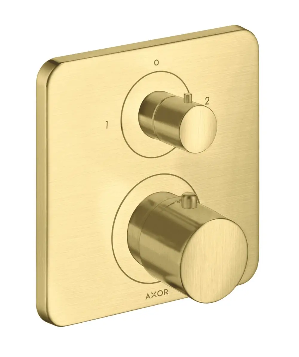 Thermostat von AXOR in gebürstetem Messing, bestehend aus zwei runden Reglern zur Temperatur- und Wasserumstellung, montiert auf quadratischem Plattenhintergrund.